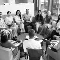 people and culture as shown around a conference table